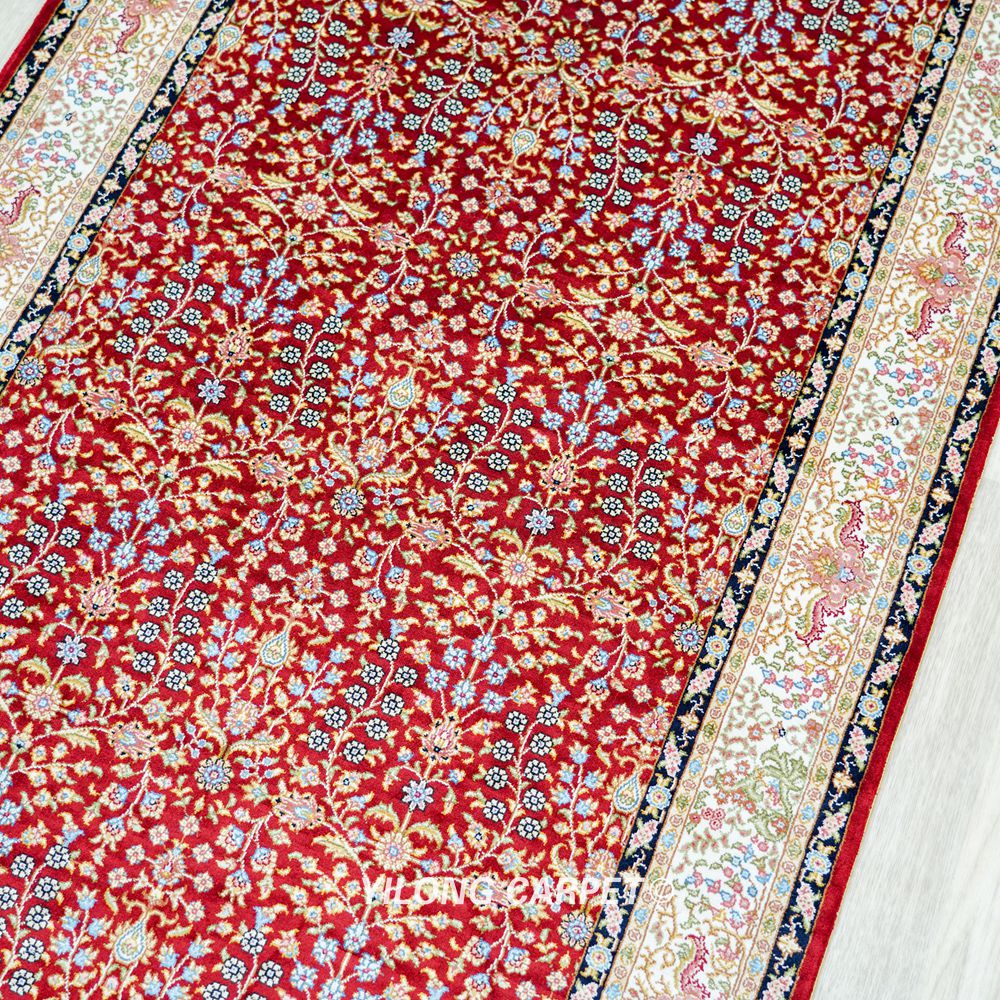 burgundy silk runner rug close-up craftsmanship