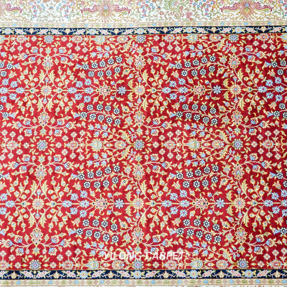 hand-knotted silk runner rug fringe and edge detail